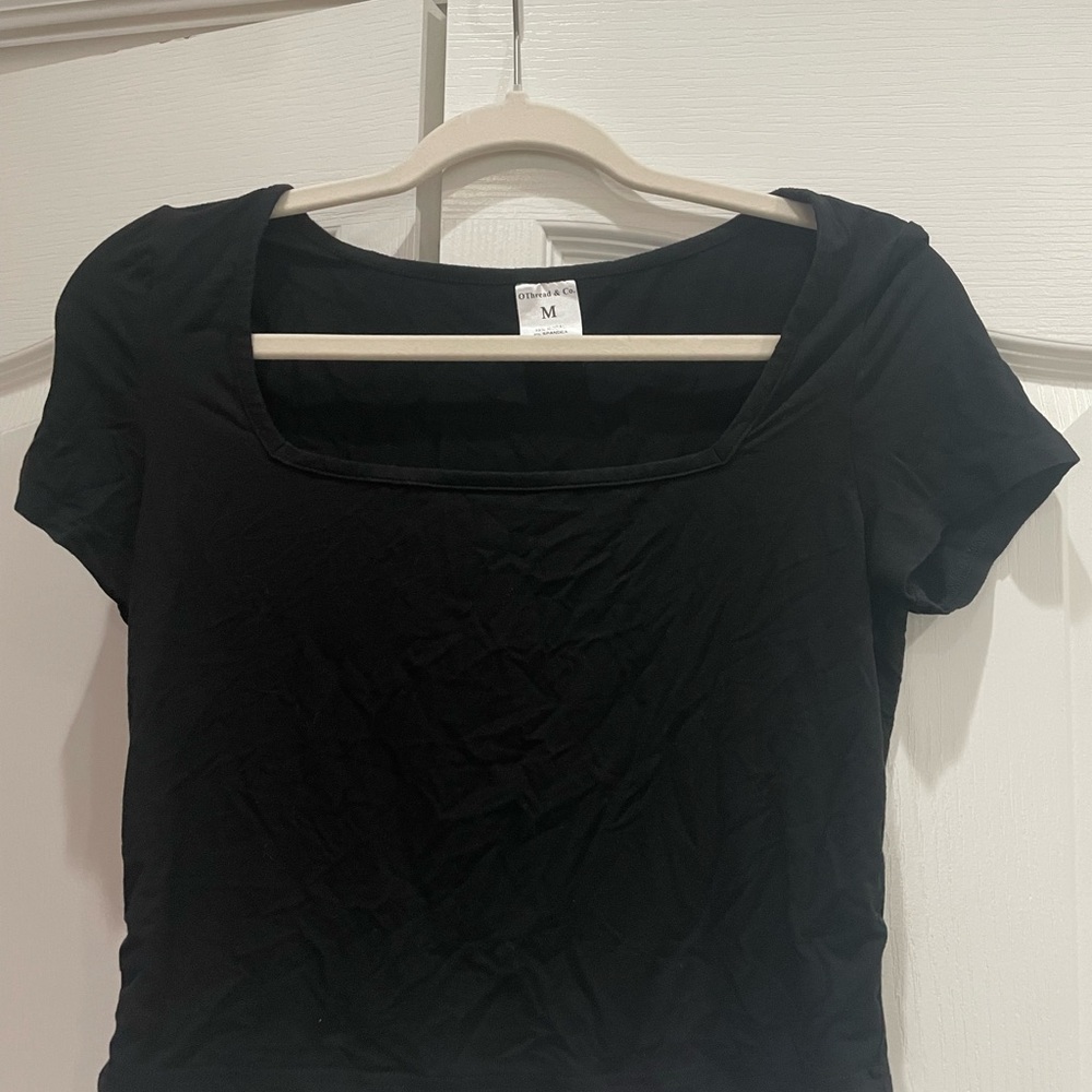 Black square neck